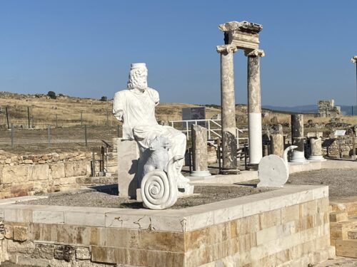 A statue of Pluto, god of the underworld, stood above a watery gate rumored to be the gate to and from the underworld itself. Next to him were two serpents and a three-headed dog for additional protection.