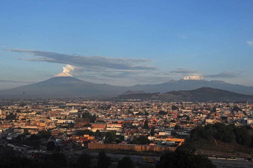 Popocatépetl and Iztaccíhuatl with the town of Cholula.