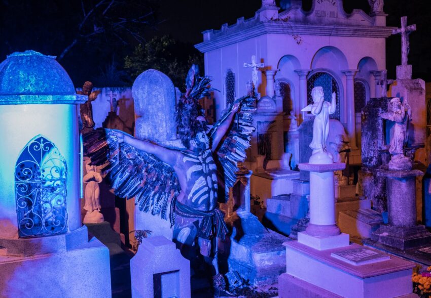 Strange sightings in the Mérida cemetery included this young man dressed as a Maya warrior. The cemetery was awash in an eerie blue glow.