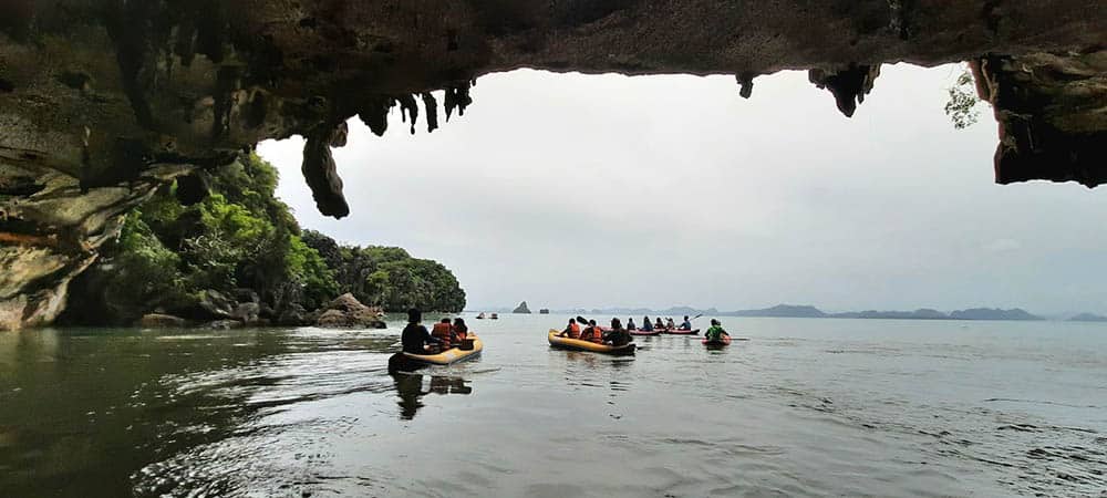 On a sea canoe paddling through a stunning sea cave