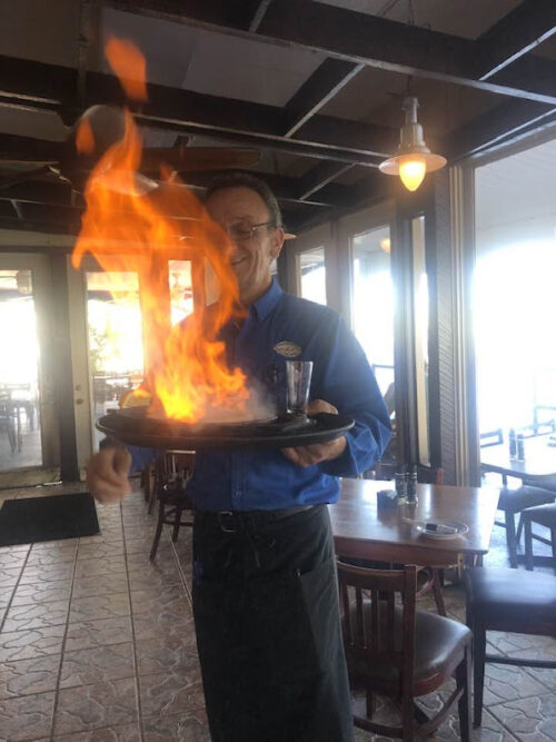 Flaming Saganaki at Dimitri's Restaurant in Tarpon Springs- photo by Noreen Kompanik