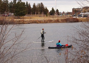 Paddleboarder and kayaking in Bend...on the same day that we went skiing.