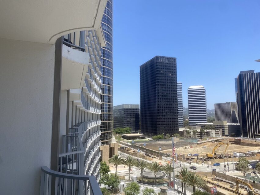 The view from the writer's balcony looks to the sweep of Century City high-rises.