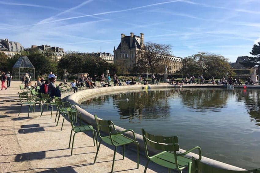 Classic green chairs invite you to admire the view at the Tuileries.