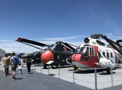 Military helicopters on display on the flight deck of USS Intrepid