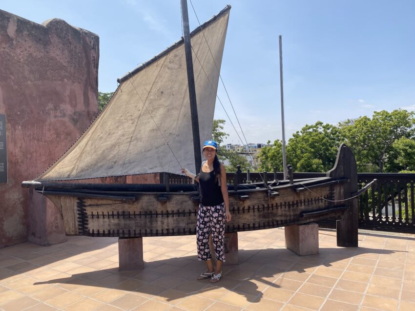 A mini replica of a dhow, a traditional Arab ship, stood at the entrance to the Oman House.