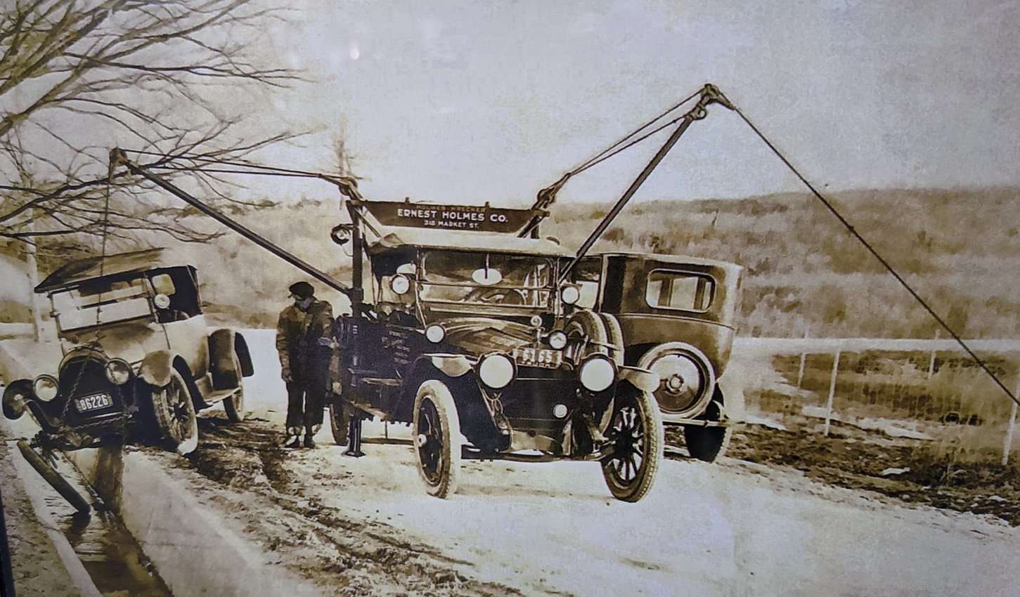 An early tow truck. on display at the Towing Museum