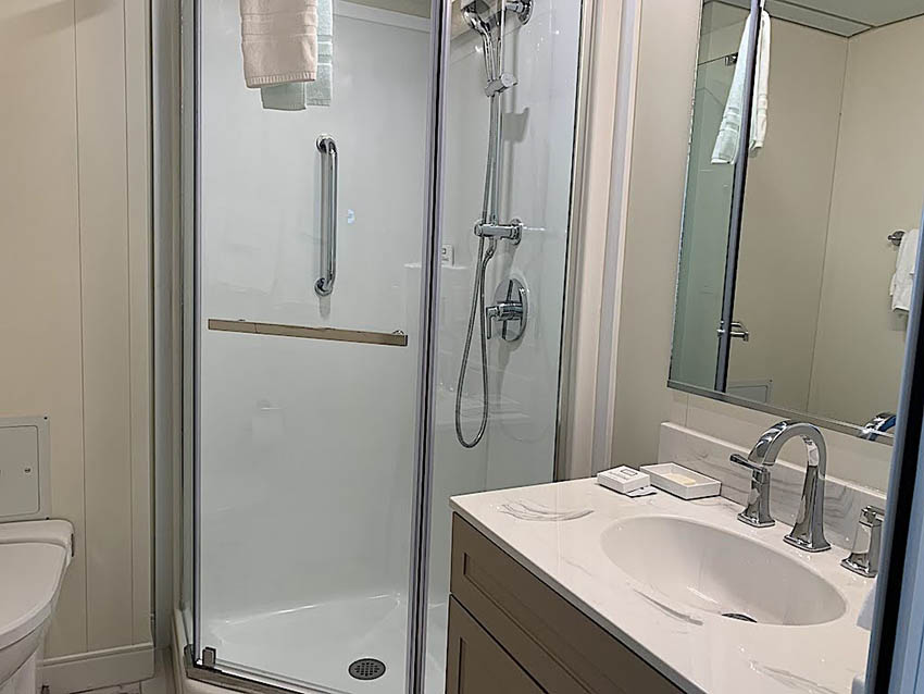 My bathroom with walk-in shower in solo stateroom.