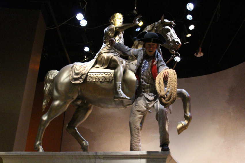 Tearing down King George III statue in the Museum of the American Revolution.